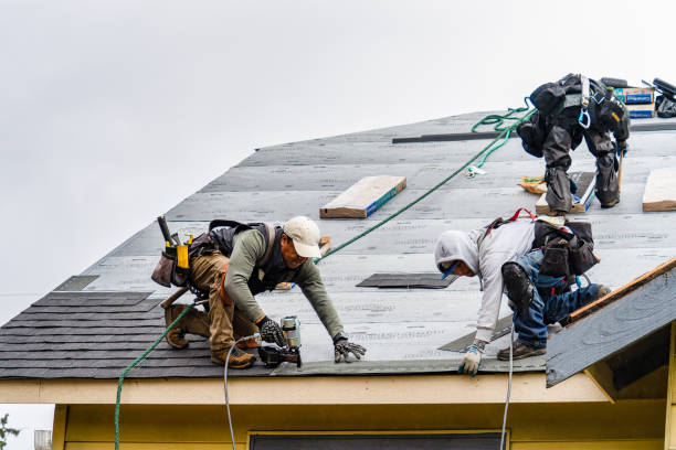 Professional Roofing technician working in Becket, MA
